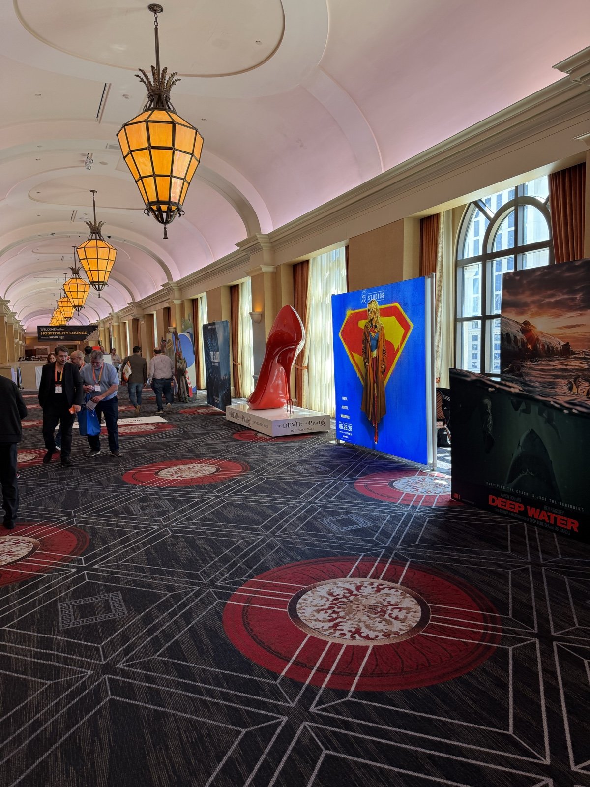The promenade at Caesars Palace during CinemaCon 2026, with film campaign banners hanging overhead
